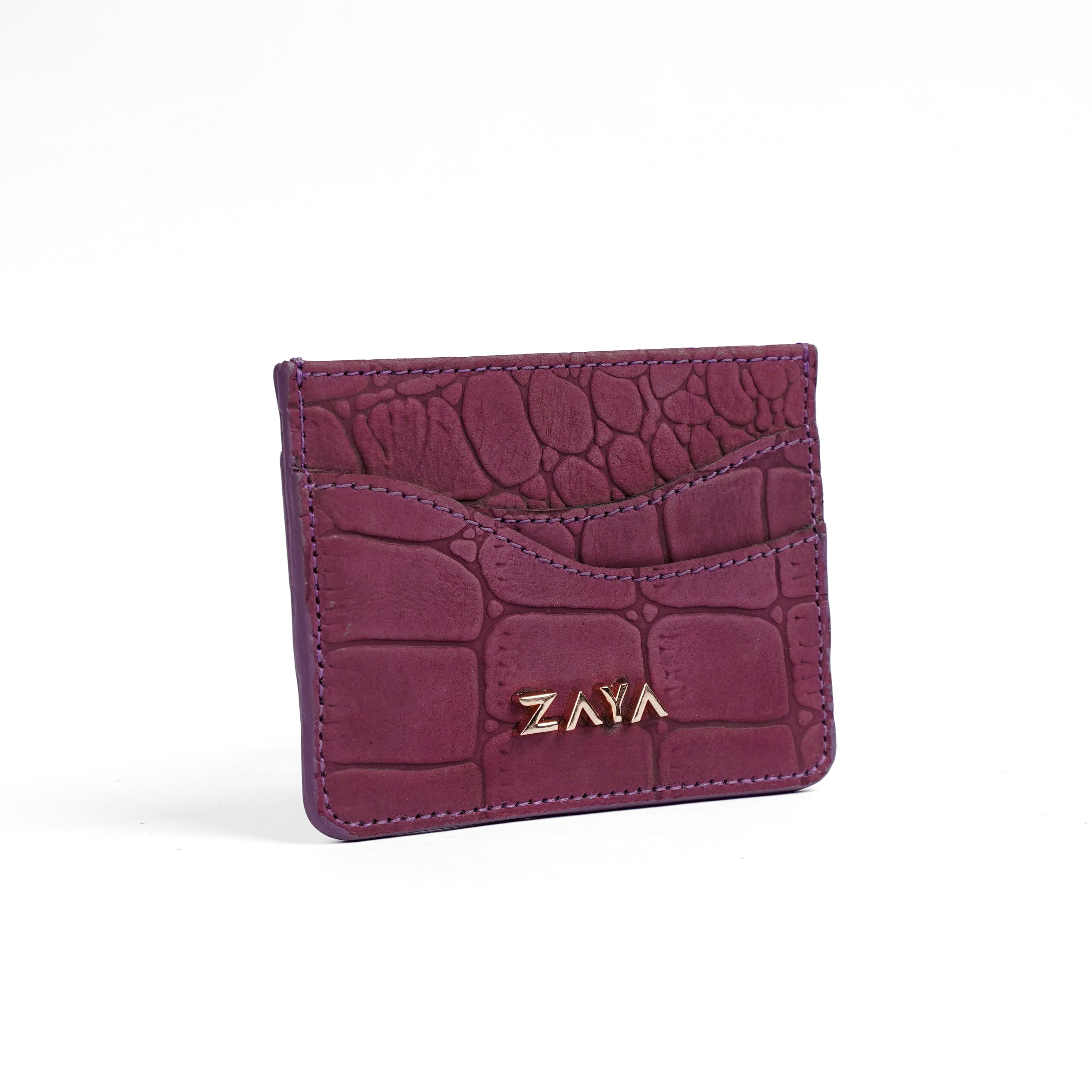 Maroon crocodile-textured cardholder with 'Zaya' branding on a white background